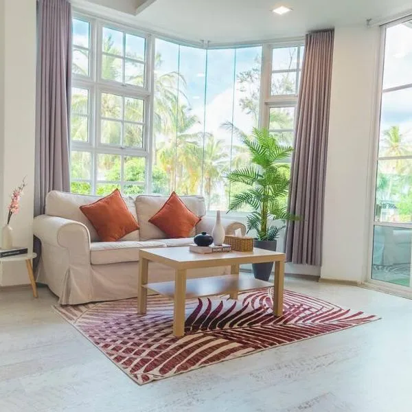 Cozy 1BR apartment by beach - partial ocean view，位于胡鲁马累的酒店