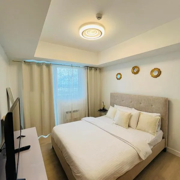 Double Deluxe Room with Mount Arayat View at Azure North San Fernando Pampanga，位于圣费尔南多的酒店