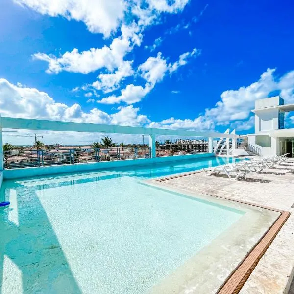 CARIBBEAN DELUXE Ducassi SUITES STUDIOS HOTEL ROOFTOP POOL Beach CLUB & SPA，位于蓬塔卡纳的酒店