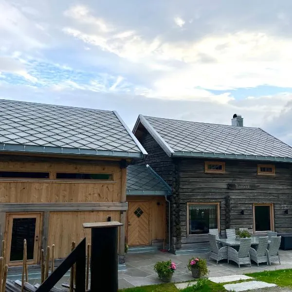 Rudland Gård - Unik gårdsovernatting i stabbur fra 1750，位于Sør-Fron的酒店