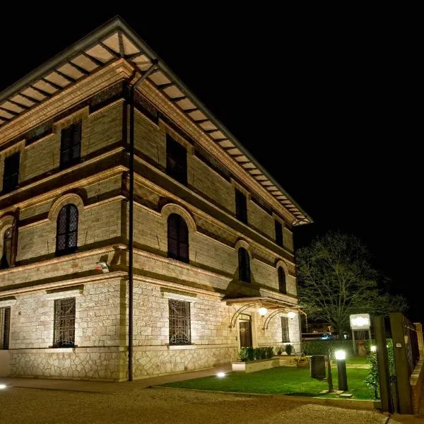 拉斐尔公园别墅酒店，位于Passaggio Di Assisi的酒店