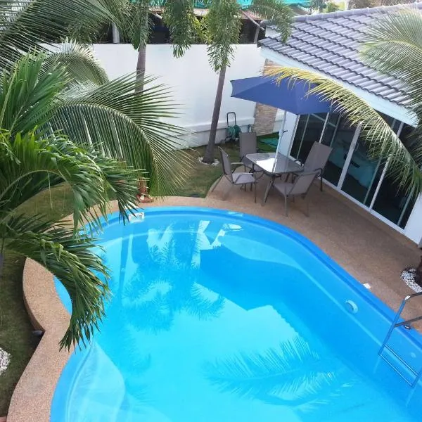 椰子棕榈旅馆，位于Amphoe Kantharawichai的酒店