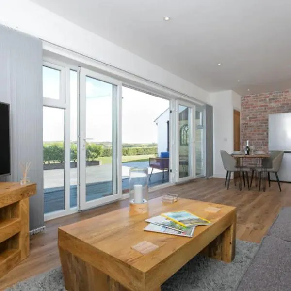 Adorable 1 bedroom Country Cottage，位于Bodewryd的酒店