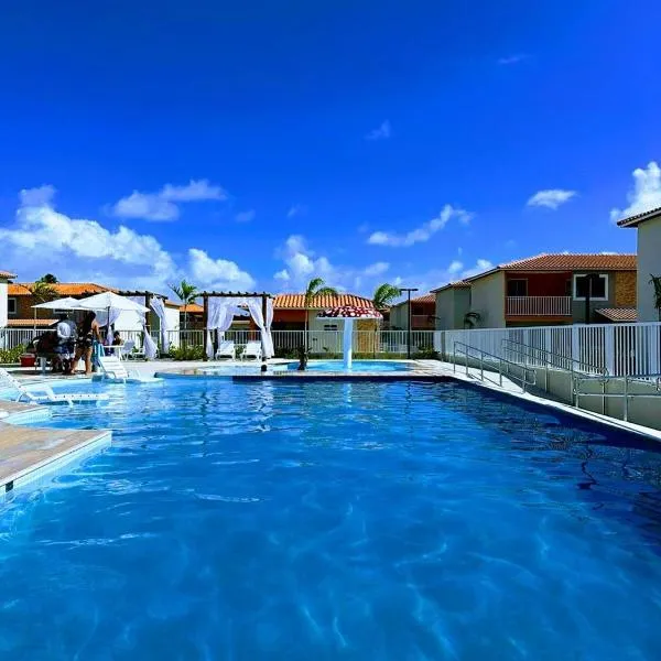 Ap 2 quartos tipo resort a passos da praia da barra，位于阿拉卡茹的酒店