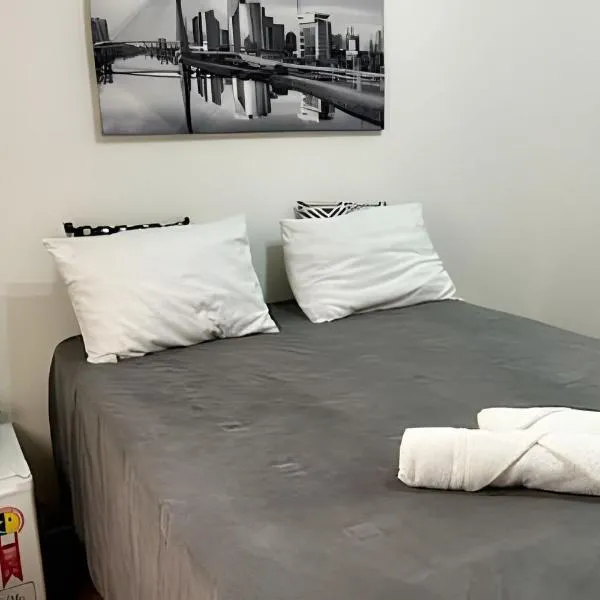 0002 - Suíte Conforto Exclusivo Bosque Maia，位于瓜鲁柳斯的酒店