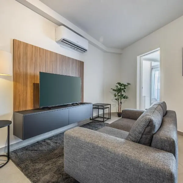 Modern Marvel Apartment with city views，位于姆西达的酒店