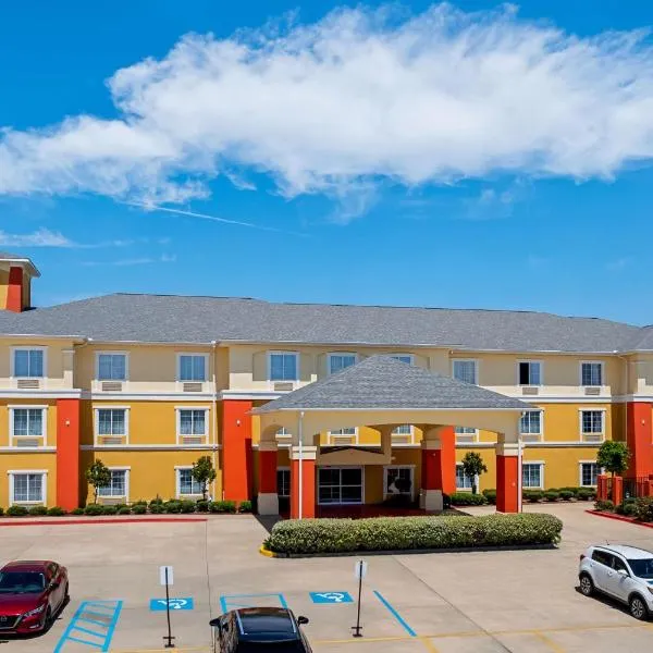 玛吉旅馆及套房 - 贝斯特韦斯特优质酒店，位于Magee的酒店