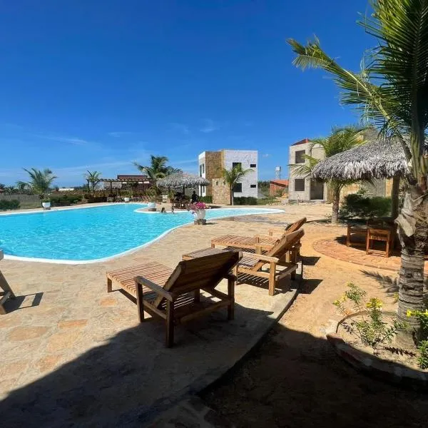 Chalé Paraíso, Chaleville Maramar - Conforto, segurança, internet e Jacuzzi Vista mar，位于路易斯科雷亚的酒店