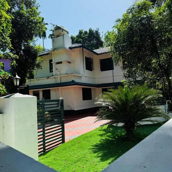 Dream House Near IIM Kozhikode & NIT Calicut，位于科泽科德的酒店