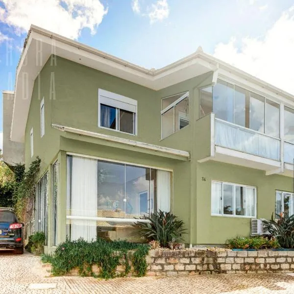 Dragon View Beach House Vista Mar Lagoa Praia Part，位于弗洛里亚诺波利斯的酒店