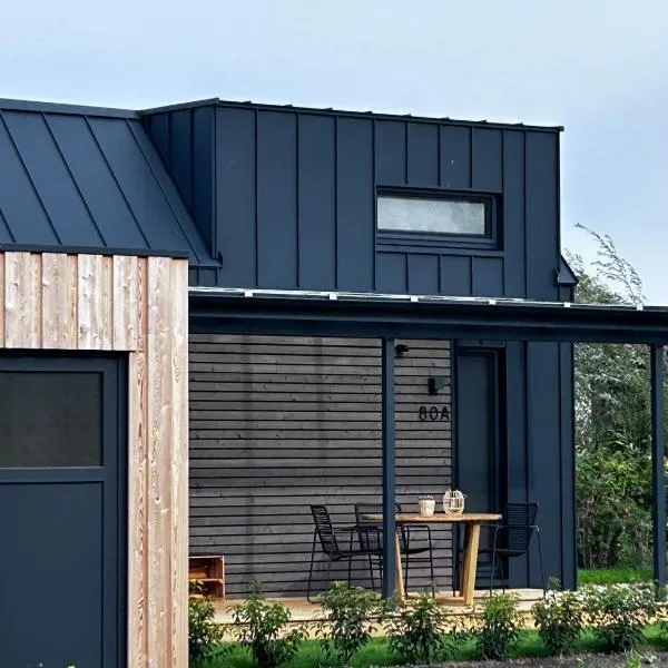 Lykke Huus Tinyhaus an der Nordsee mit Fasssauna，位于Schweiburg的酒店