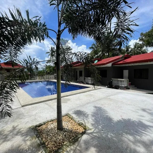 KJT Travellers Inn，位于Guindulman的酒店