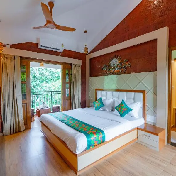 Treebo Green Village Resort with Pool, Goa，位于Maneri的酒店