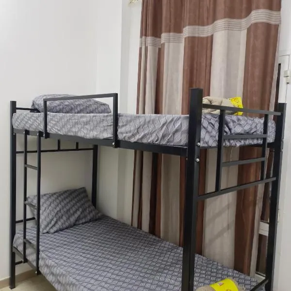 AL SHAMS MUSCAT MALE hostel，位于马斯喀特的酒店
