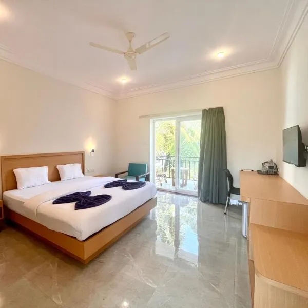 Morjim Sunset Guesthouse- Apartments with Kitchen & AC Rooms，位于莫尔吉姆的酒店