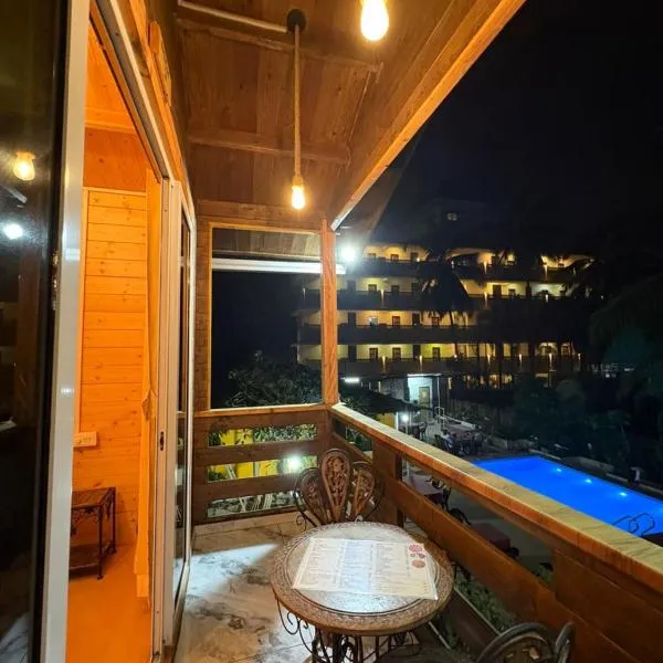 Georgies wooden homes stay，位于Goa的酒店