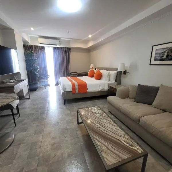 Sheryll Escapes - 1109, Phase 2 La Grande, breezy, hotel amenities!，位于安吉利斯的酒店