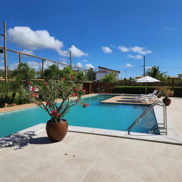 Village Sol e Brisa, primeiro andar, 2 quartos, vista Jardim，位于伊塔齐米林的酒店