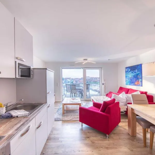 Wohlfühloase in der Hafenresidenz mit Balkon und Wellness，位于瓦伦的酒店