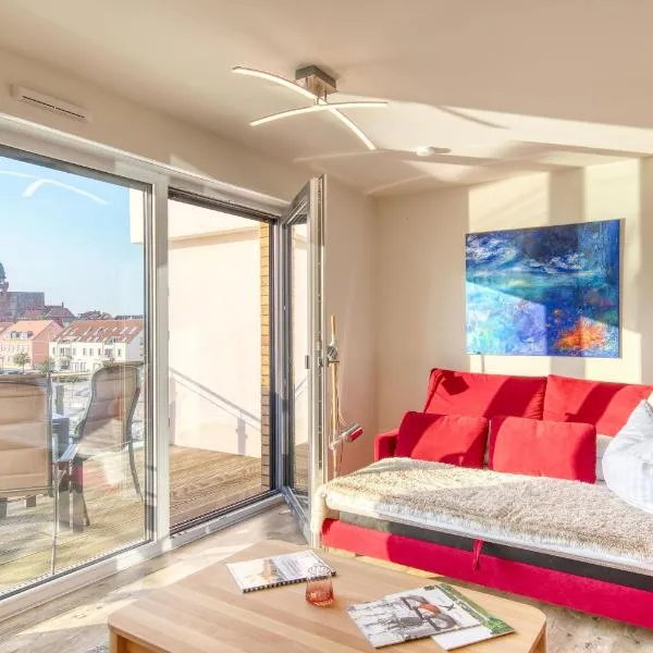 Wohlfühloase in der Hafenresidenz mit Balkon und Wellness，位于瓦伦的酒店