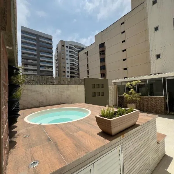Apt 3q luxo com ar e jacuzzi na Beira Mar，位于瓜拉派瑞的酒店