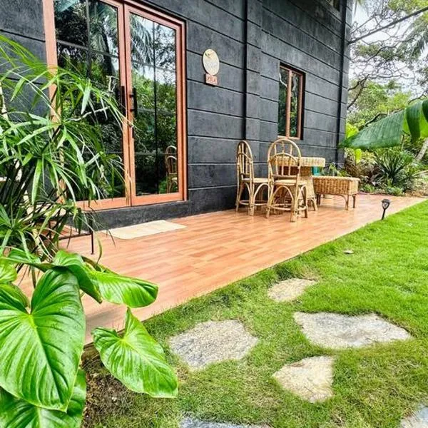 Casita Ysla Tiny Home with garden kitchen wifi 2 scooters，位于爱妮岛的酒店
