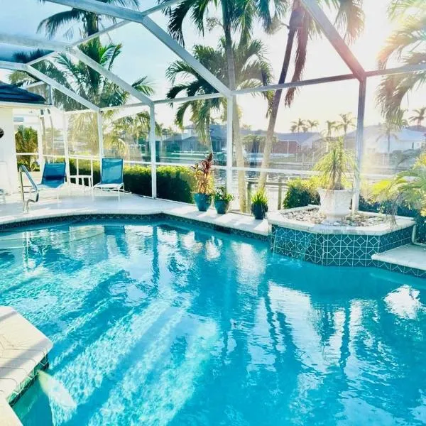 Free HeatedPool on SailboatAccessCanal boat lift，位于珊瑚角的酒店