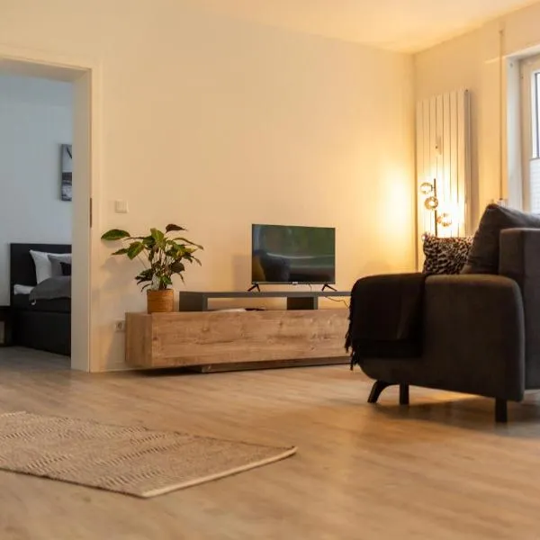 BEST STAY CityAppartment Hünfeld- SmartTV FreeWlan Balkon, in wenigen Minuten am Bahnhof, Innenstadt und doch ruhig gelegen - ideal für Paare oder Geschäftsreisen，位于欣费尔德的酒店