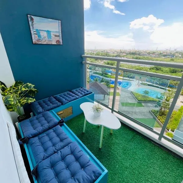 Beach Vibe Condo with PS4, Mini Karaoke, Board Games in Azure North San Fernando Pampanga，位于圣费尔南多的酒店
