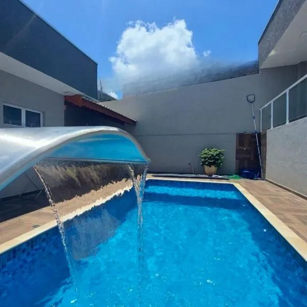 Casa de Hóspedes Jardim dos Pinheiros Piscina climatizada，位于阿蒂巴亚的酒店