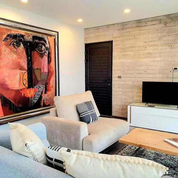 Elegante depa cerca de los arcos con amenidades，位于Hércules的酒店