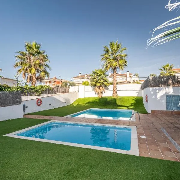 Piso con piscina y playa en Calafell, Mas Mel，位于卡拉费尔的酒店