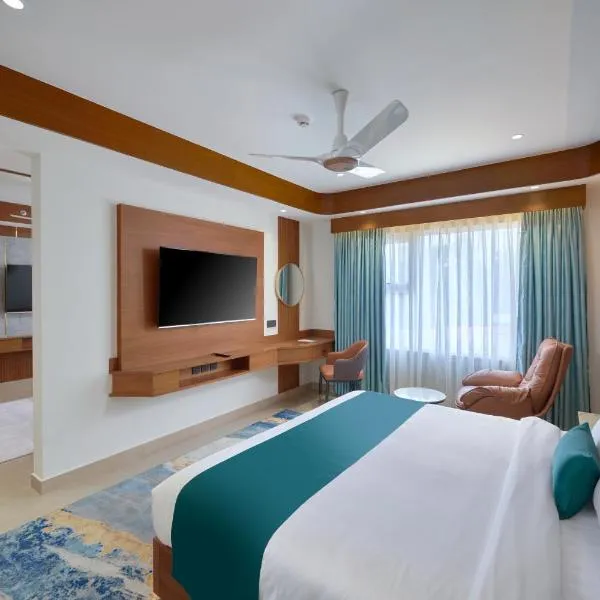 Kowju Airport Hotel Calicut，位于Kondotti的酒店