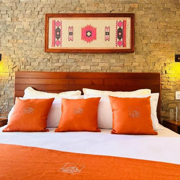 Hotel & Suites Cerro Roj0，位于Tlatlauquitepec的酒店