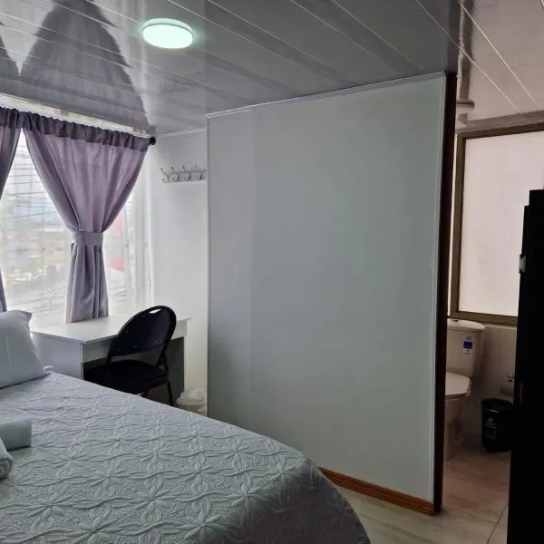 Habitación baño privado garaje moto, Manizales，位于马尼萨莱斯的酒店