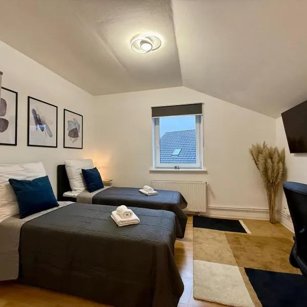 TT Living Apartments Rellingen I 1 & 2 Schlafzimmer I Küche I Spülmaschine I Parkplatz，位于瑞林根的酒店