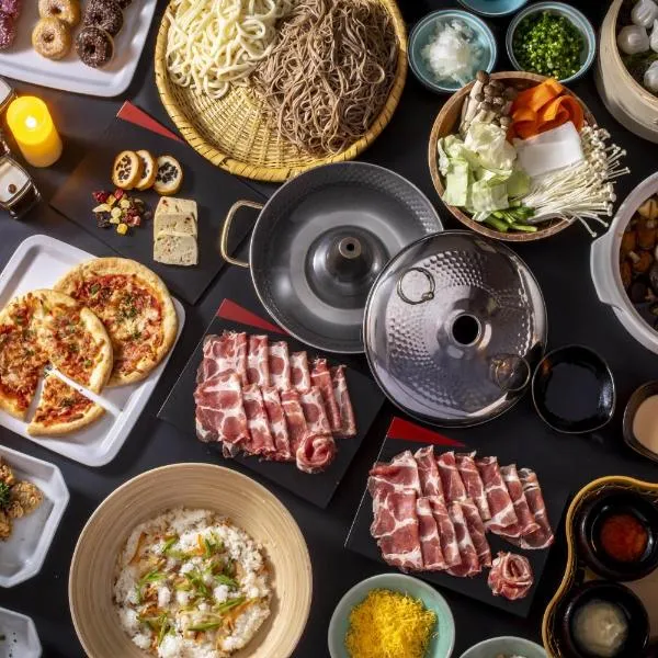 白马伯格之家酒店，位于小谷村的酒店