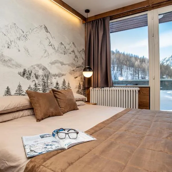 WHISPERING PINES LODGE Mountain view apartment with ski-in access，位于布勒伊-切尔维尼亚的酒店