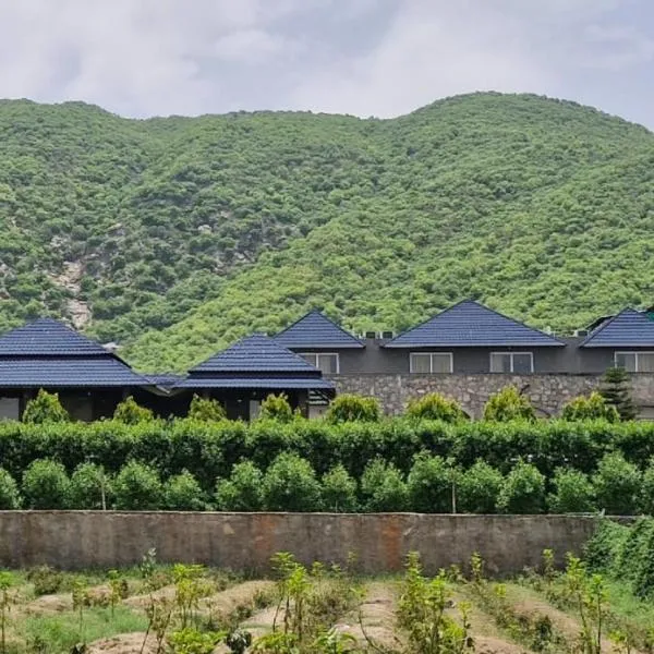 Nature Retreat Resorts- Life in Nature，位于布什格尔的酒店