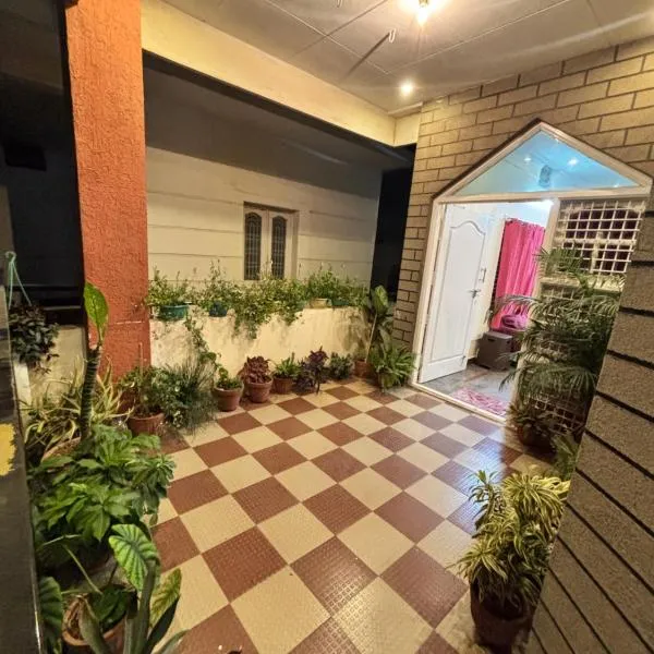 Marigold Homestay - Mysore，位于迈索尔的酒店