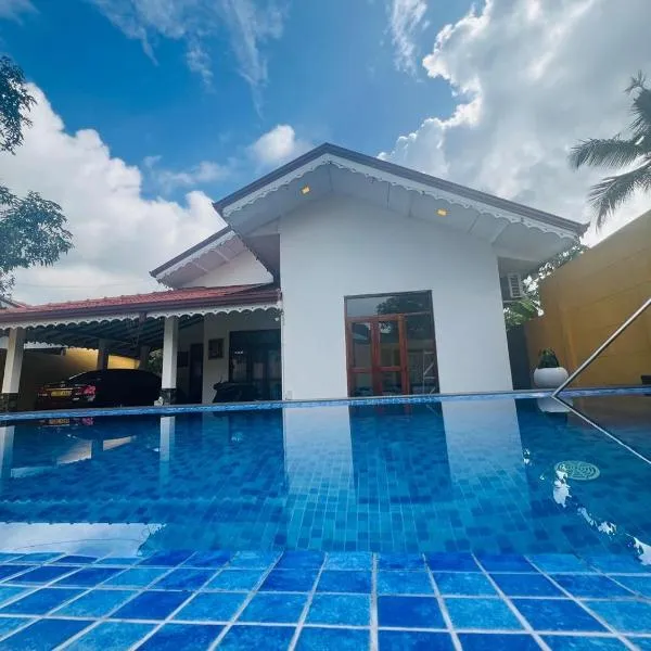 Kingz Kottage by Andy's Villa，位于尼甘布的酒店