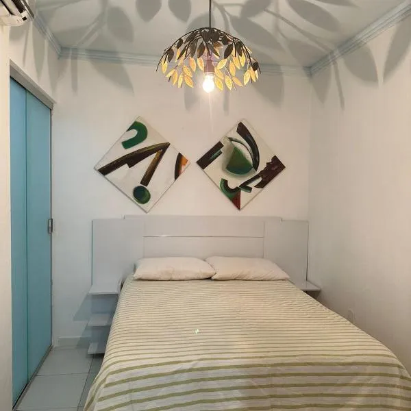 Suíte Sol e Lua Guriri - Conforto a 80m da Praia de Guriri，位于圣马特乌斯的酒店