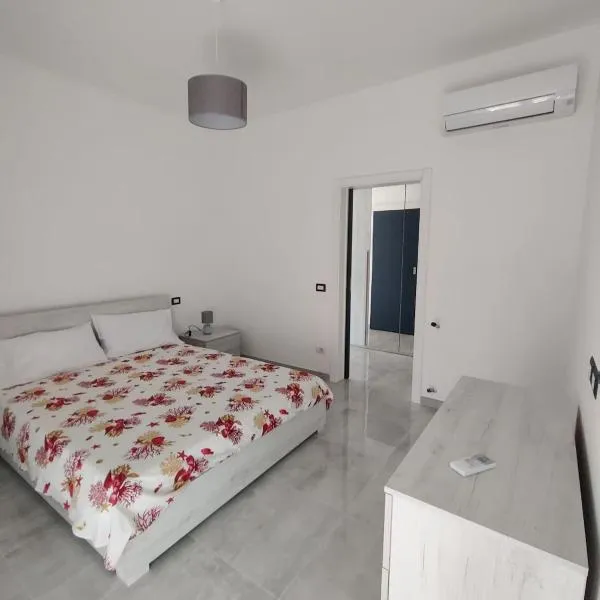 The Blue House - Parking Space Included，位于明图尔诺的酒店