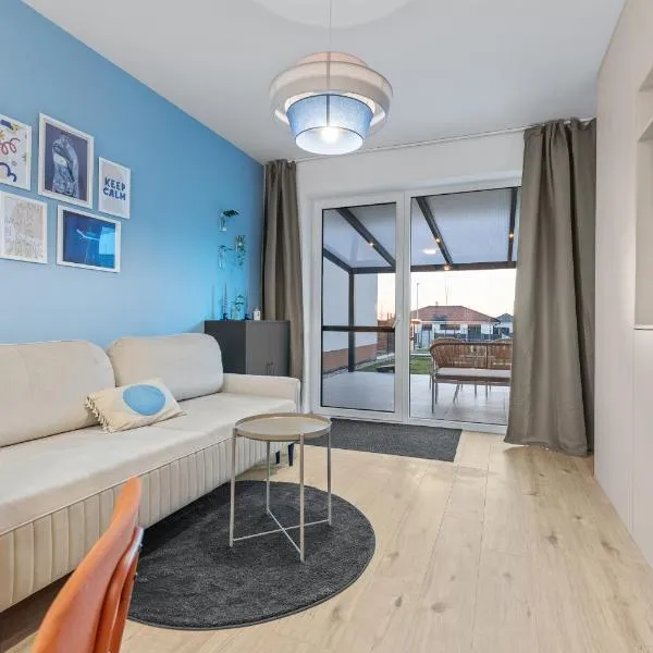 Cozy Apt w AC, Garden & Parking，位于莫德拉的酒店