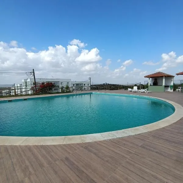 Ap condomínio Bosque com piscina，位于加拉尼温斯的酒店