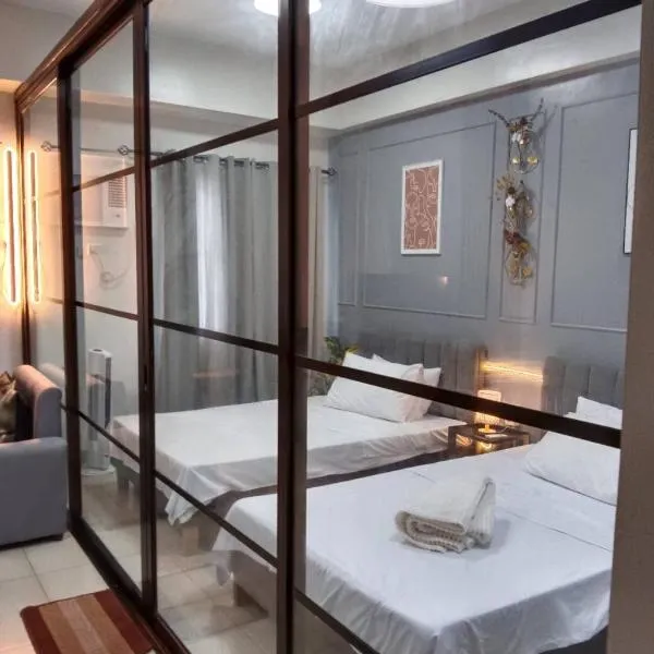 Cozy Home and Staycation Resort at Hill Residences Novaliches QC，位于马尼拉的酒店