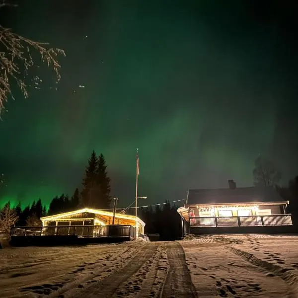 Koselig feriehus med jacuzzi i Nordre Osen, kun 40 minutter fra Trysil skianlegg，位于Åmot的酒店