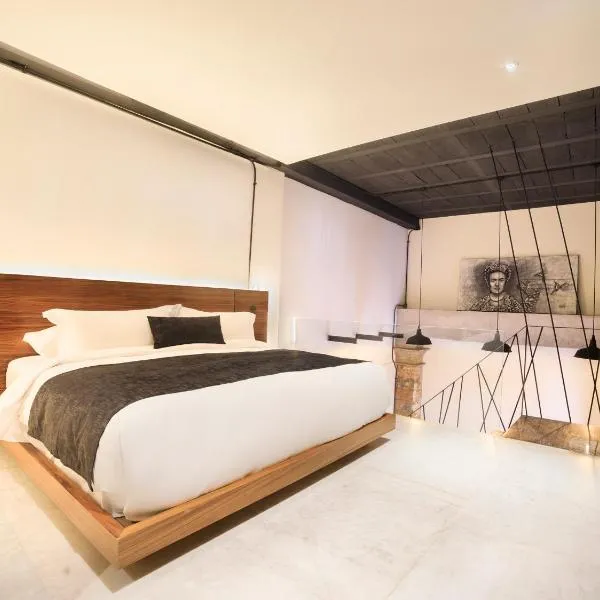 Hotel Tila，位于乔卢拉的酒店