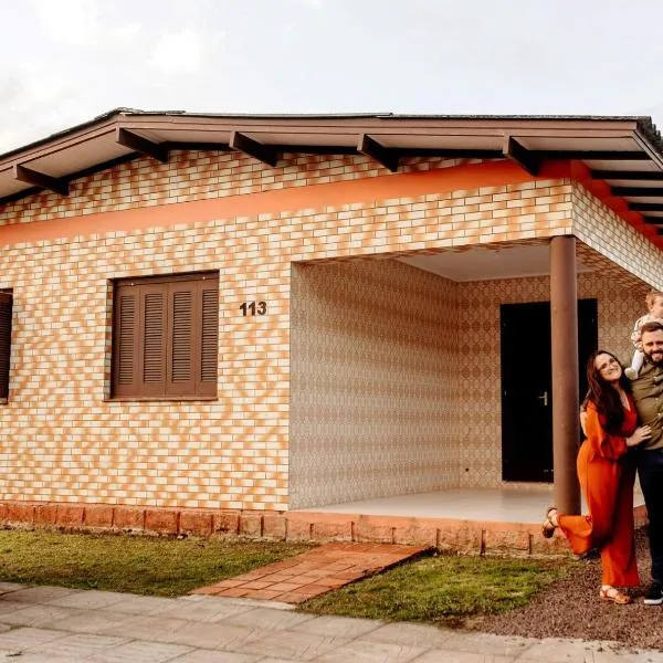 Casa de praia na Paraíso，位于托雷斯的酒店