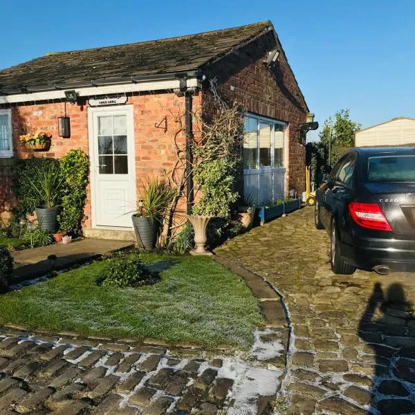 Sefton Cottage，位于奥姆斯柯克的酒店